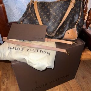 Authentic Used Louis Vuitton has some stains.